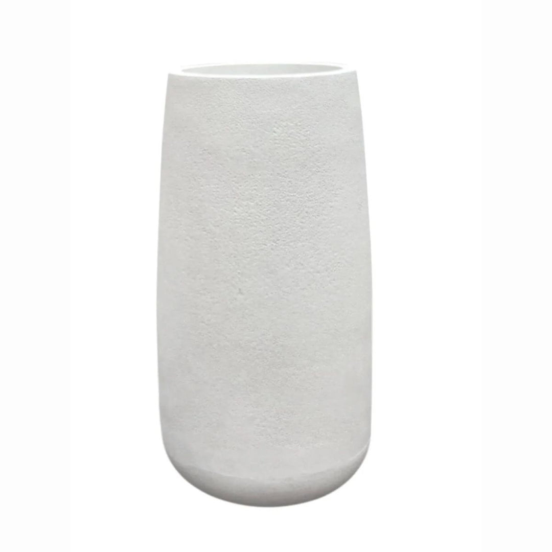 A tall, cylindrical white ceramic vase with a textured, matte finish and a flared rim, shown against a plain white background.