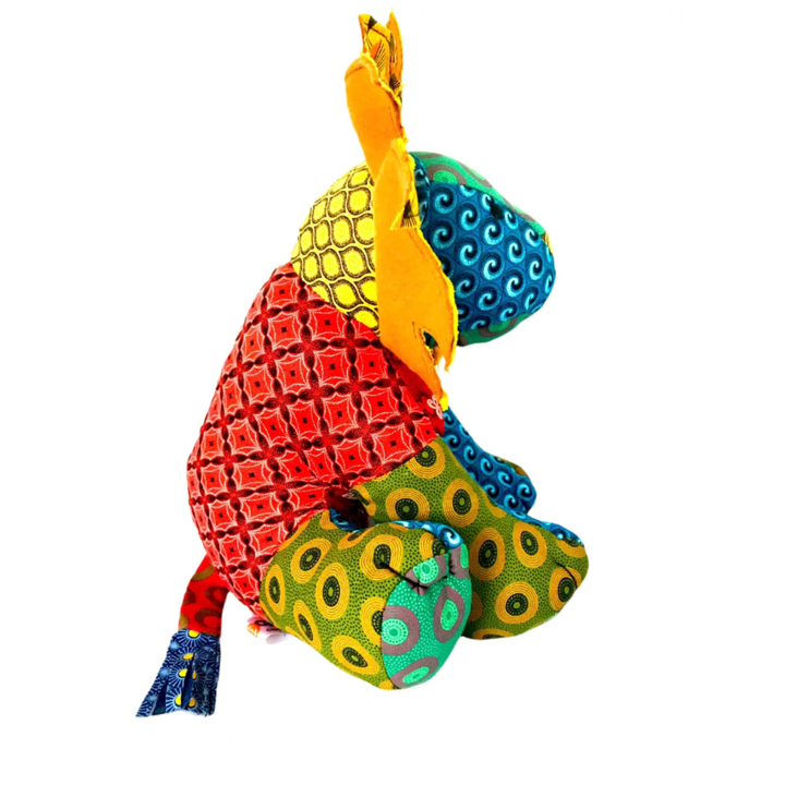 Other side of Lion Shweshwe Stuffed Toy, with colourful fabric on white background