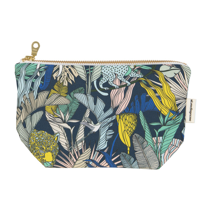 Cosmetic bag with tropical leaf pattern on a white background