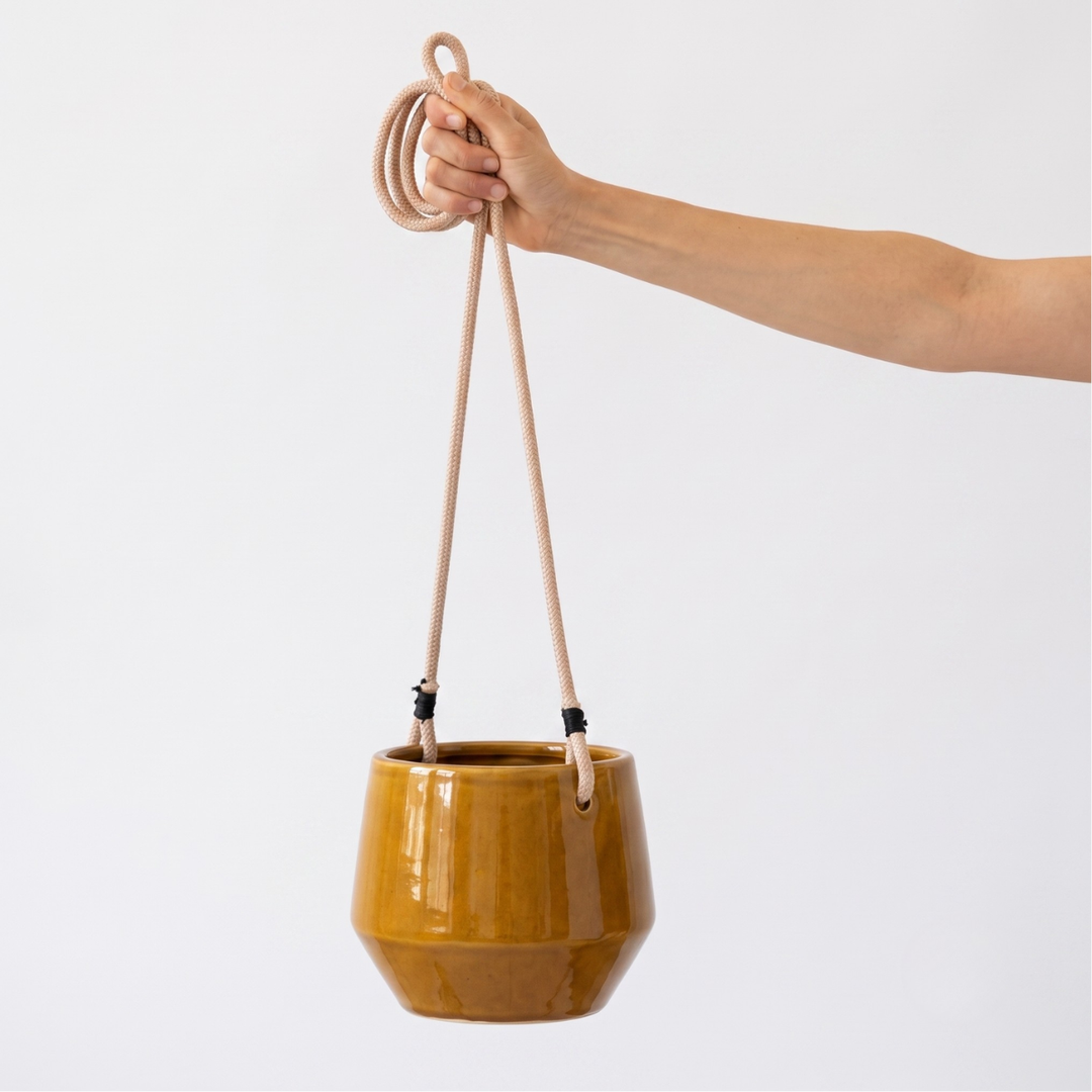 Pogo Hanging Planter - Burnt Mustard 16cm handheld for scale