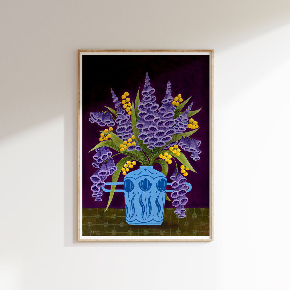 Framed artwork of a blue vase with purple flowers and yellow berries on a dark background.