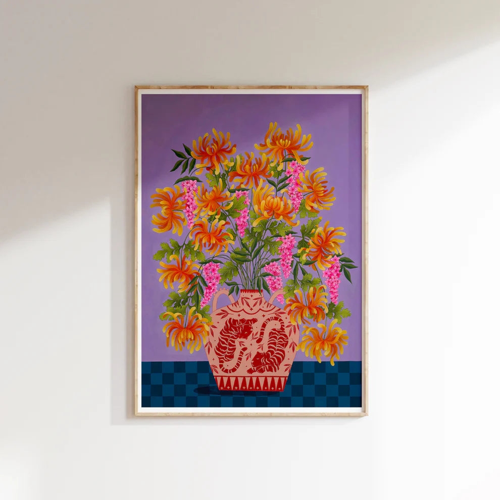 Framed Fine art print of a bright orange floral display in Peach vase with tiger motif.